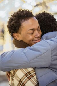 Teens hugging